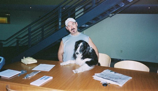 Tigger and Bruce working in the office